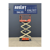 JLG 1930ES electric scissor lift (SN6420) platform raised, Auslift signage