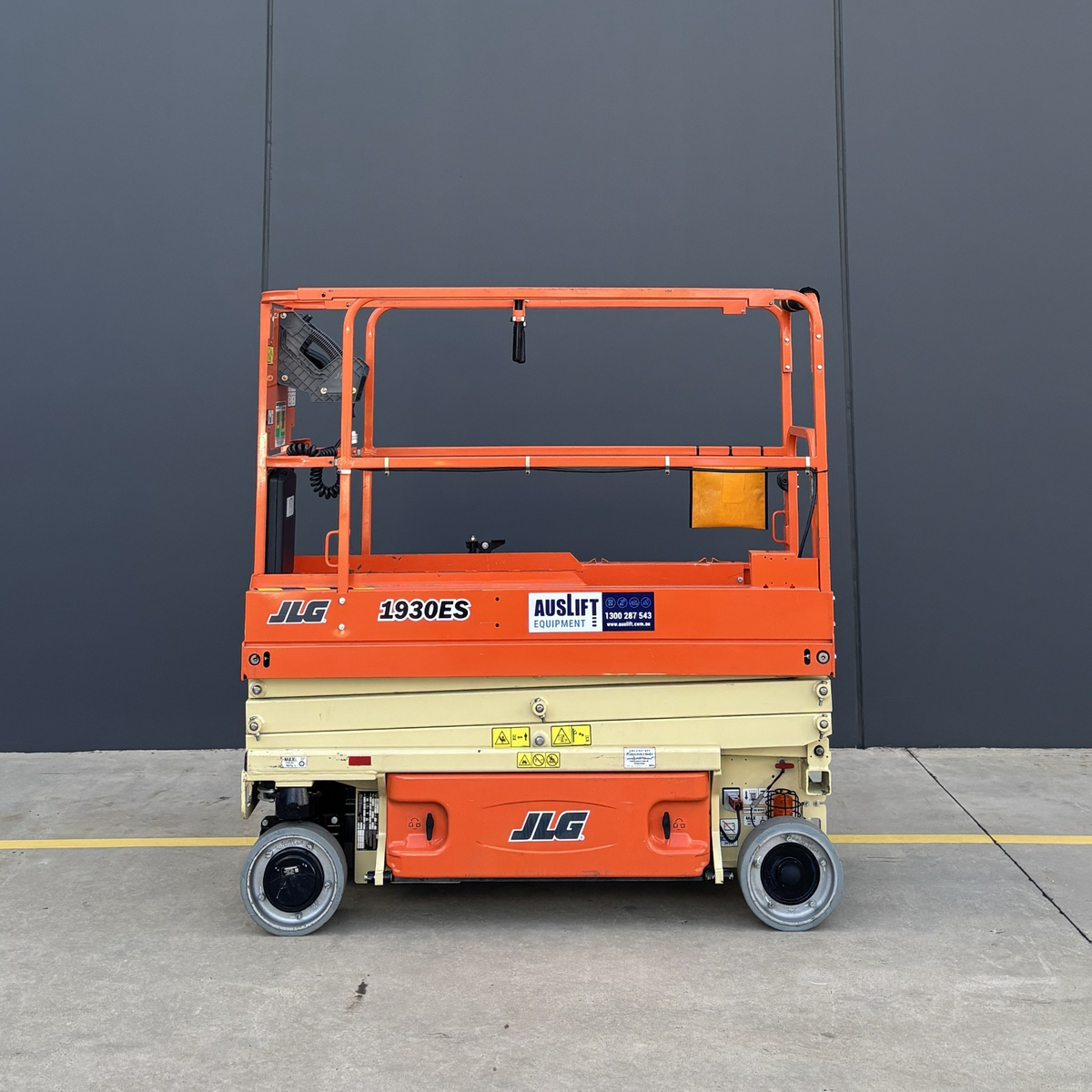 JLG 1930ES electric scissor lift (SN8095) left side view lowered position