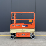 JLG 1930ES electric scissor lift (SN8095) left side view lowered position