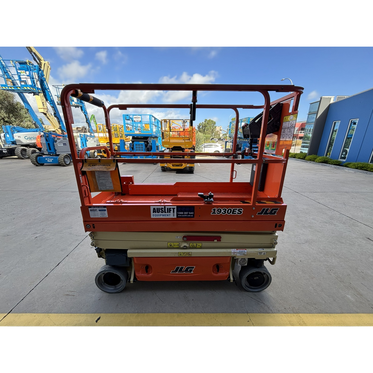 JLG 1930ES electric scissor lift (SN8095) right side view lowered position
