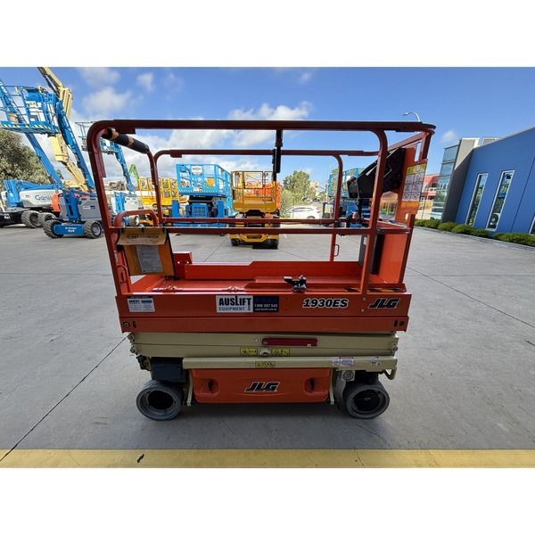 JLG 1930ES electric scissor lift (SN8095) right side view lowered position