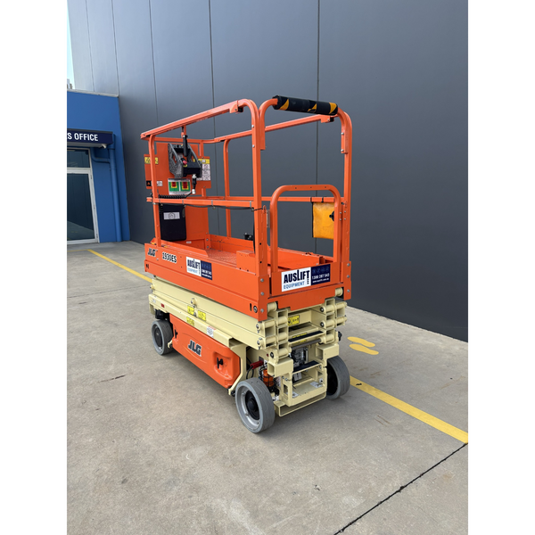 JLG 1930ES electric scissor lift (SN8095) rear left quarter view