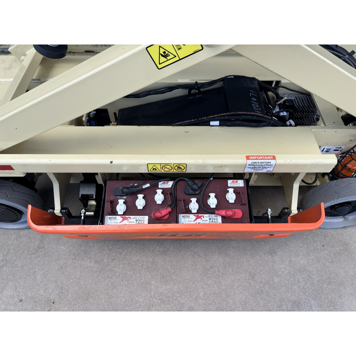 JLG 1930ES electric scissor lift (SN8095) left side battery compartment undercarriage