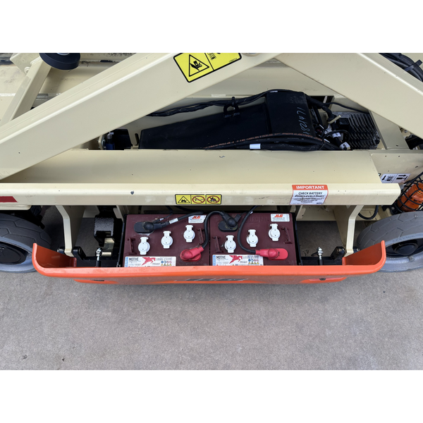 JLG 1930ES electric scissor lift (SN8095) left side battery compartment undercarriage