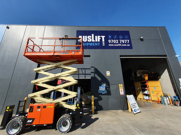 JLG 32ft RT Self Levelling Diesel Scissor Lift